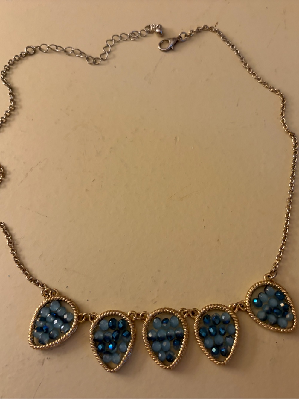 Gold-Tone Teardrop Necklace with Blue Accent Stones